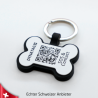 Swiss silicone dog tag with emergency contacts and health information.